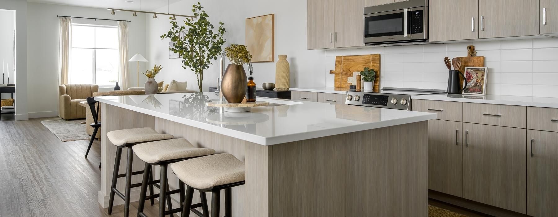 a kitchen with white cabinets