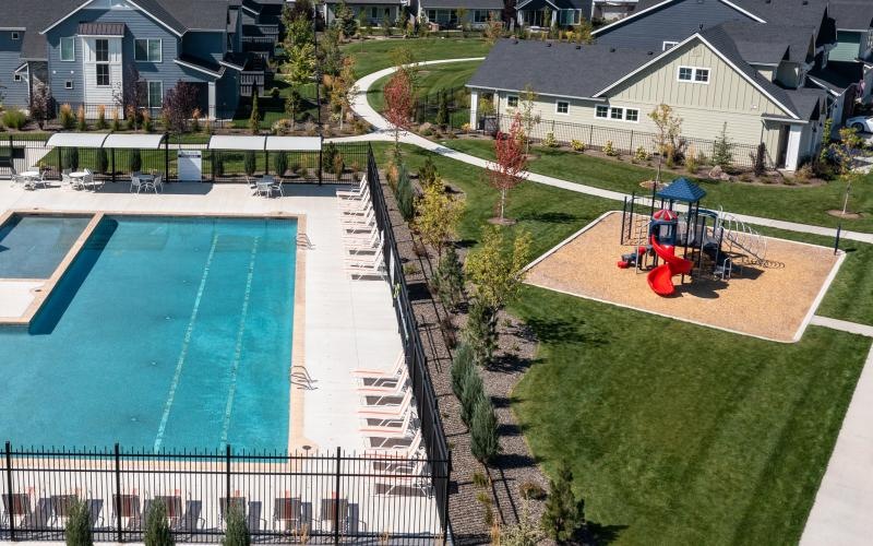 a backyard with a pool and a slide