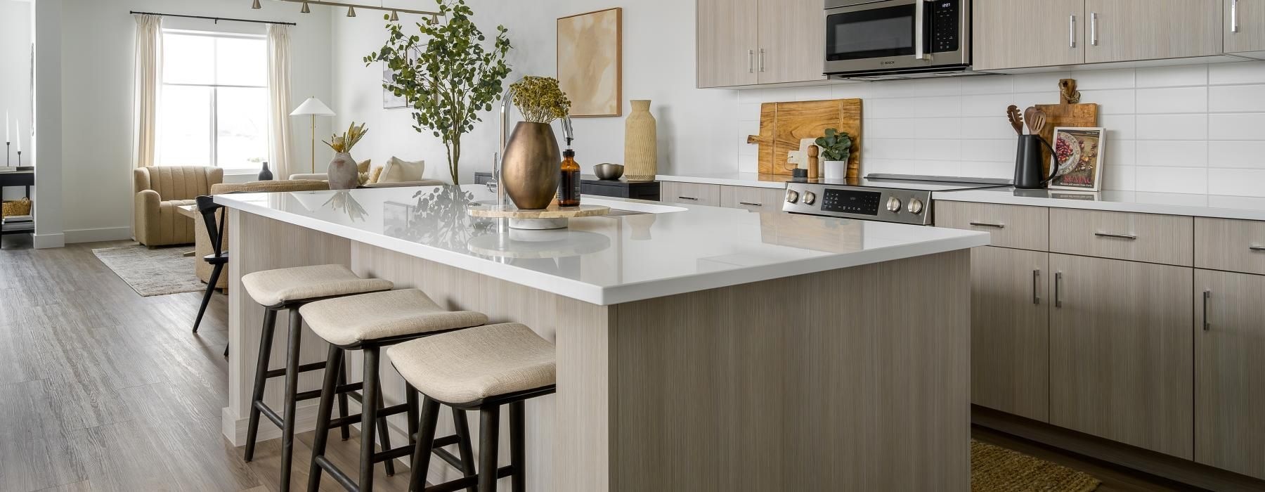 a kitchen with white cabinets